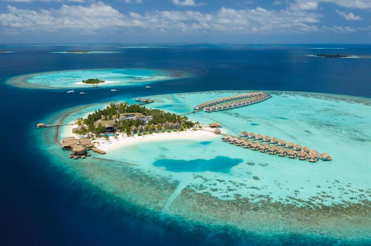 Maldives Over Water Bungalow A 5* romantic resort with wide white-sand beaches & a glorious lagoon. Free all-inclusive upgrade
