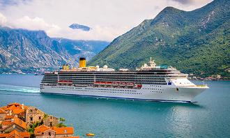 Cruises, Online Travel Agent. Cruise ship in the water.